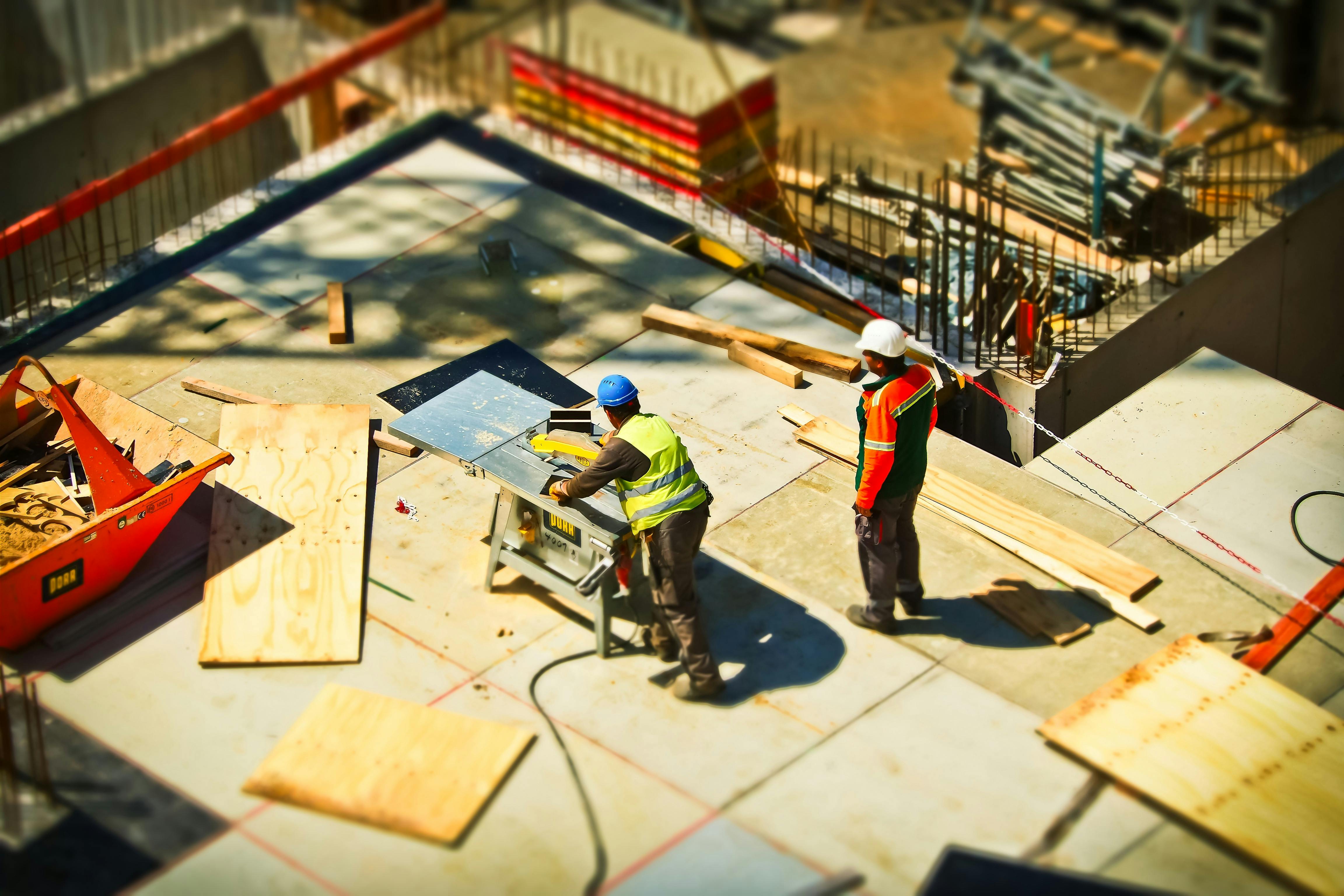Verified construction workers at a building site